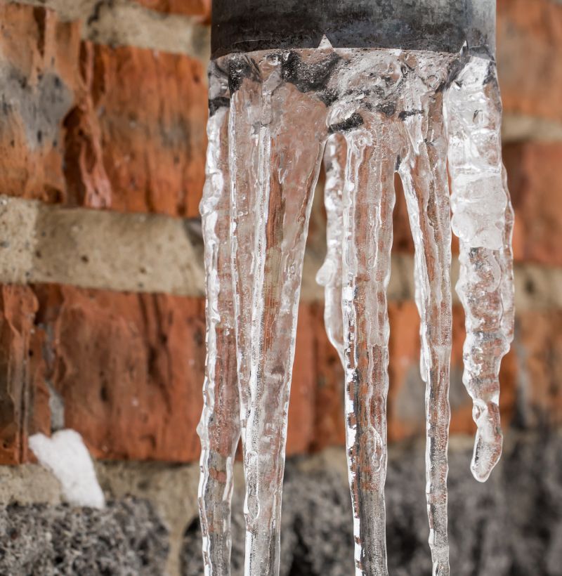 Frozen Pipe Repair Repairing a burst pipe caused by freezing temperatures