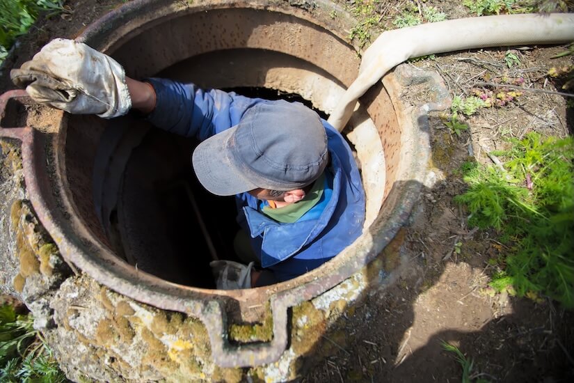 worker-in-sewer Sewer Services